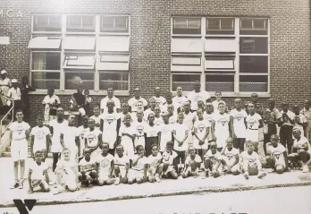 Group of kids and adults outside Patterson Avenue YMCA