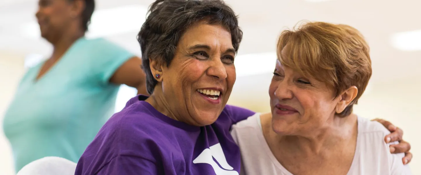 Two adult women smiling