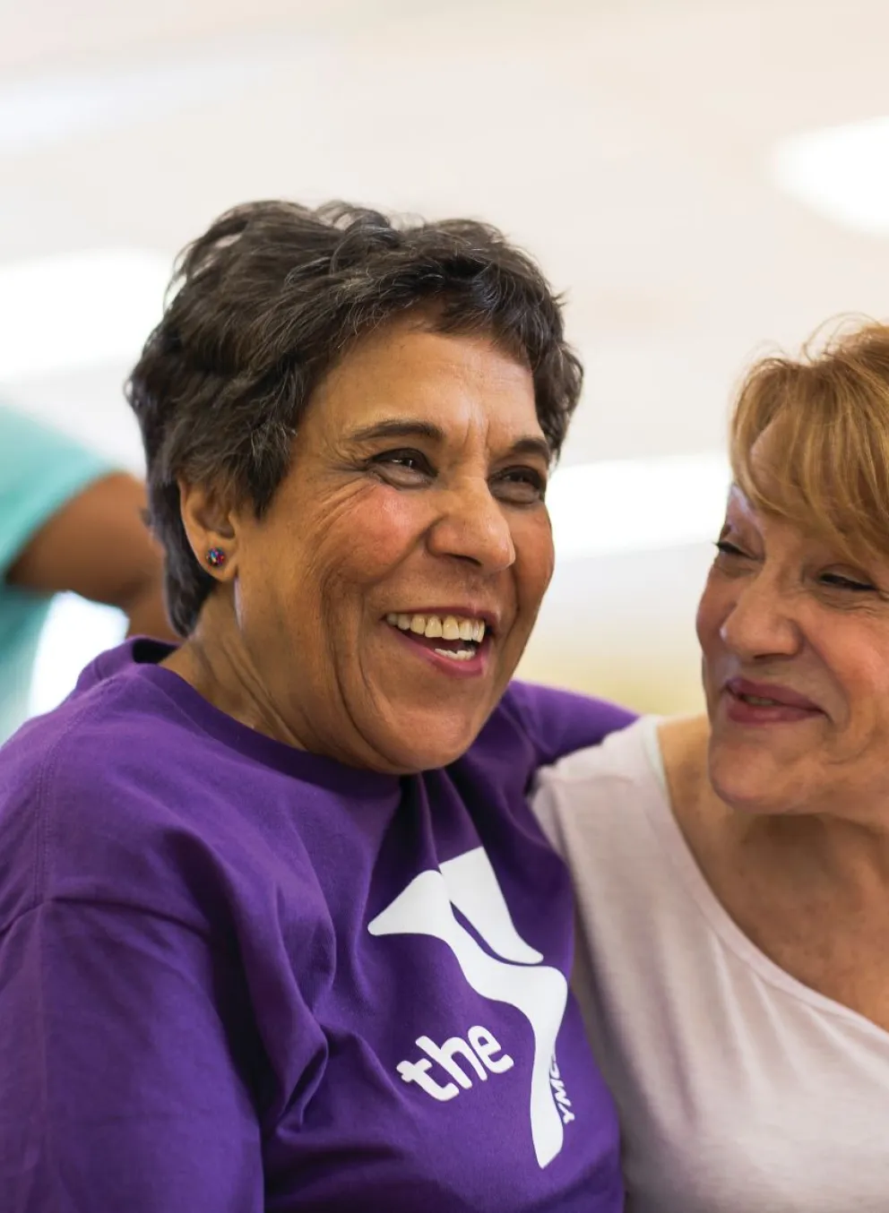 Two adult women smiling