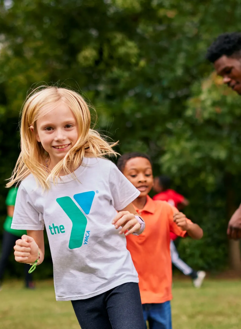 Smiling girl playing outside