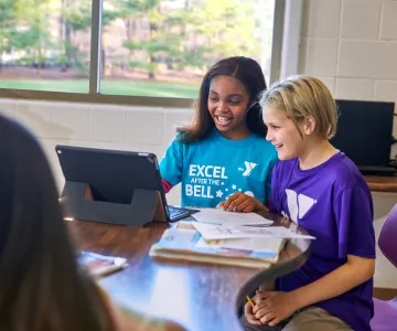 Two students on a computer