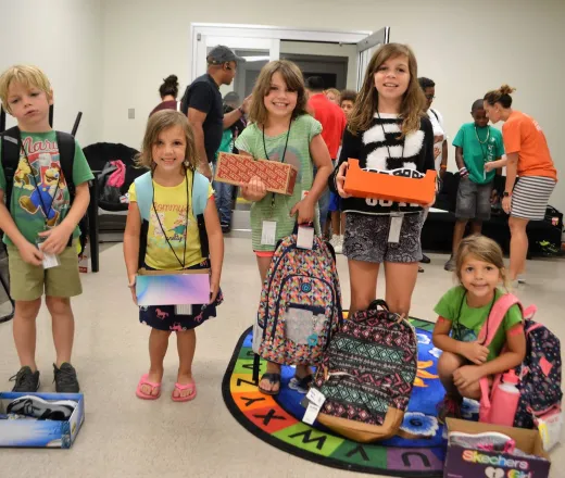 Kids with new shoes and backpacks