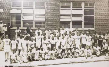Group of kids and adults outside Patterson Avenue YMCA
